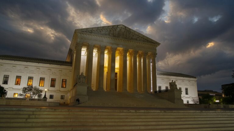 supreme court at night cloudy sky